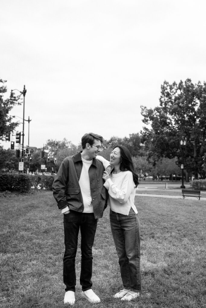 Couple standing together in park during Washington DC engagement session in Capitol Hill