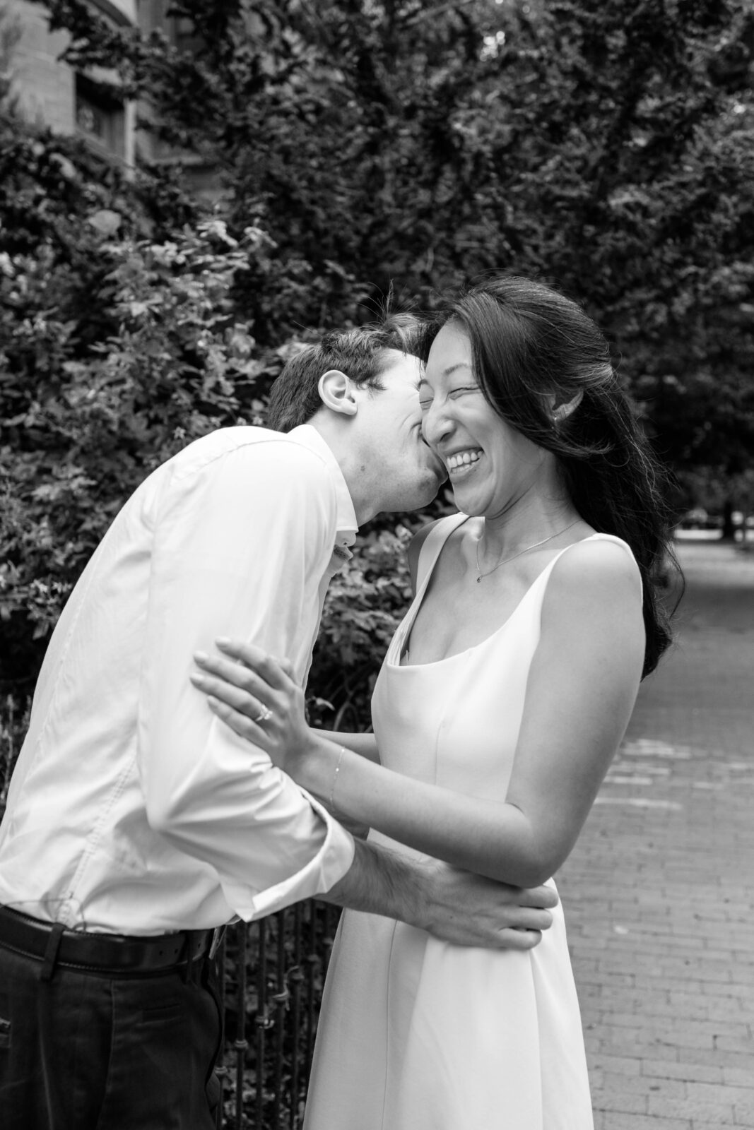 Close portrait of couple laughing together during Washington DC engagement session in Capitol Hill