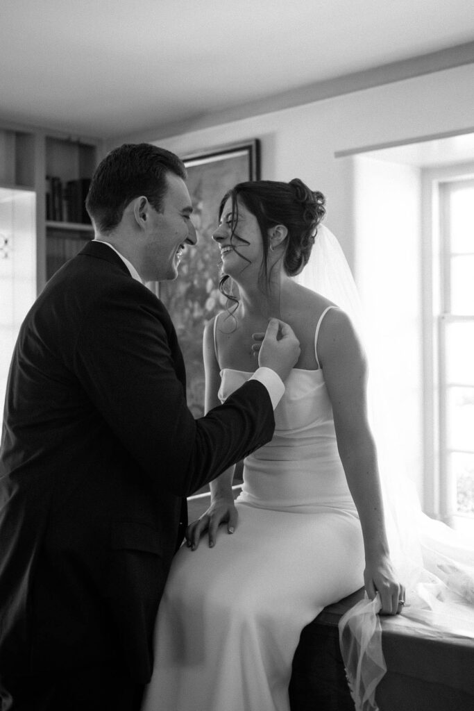 bride and groom embrace during portraits at appleford estate in pa