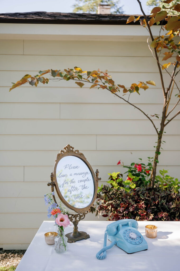 Bride and groom posing together in the elegant sitting room of the Appleford Estate manor surrounded by classic architecture and natural window light.