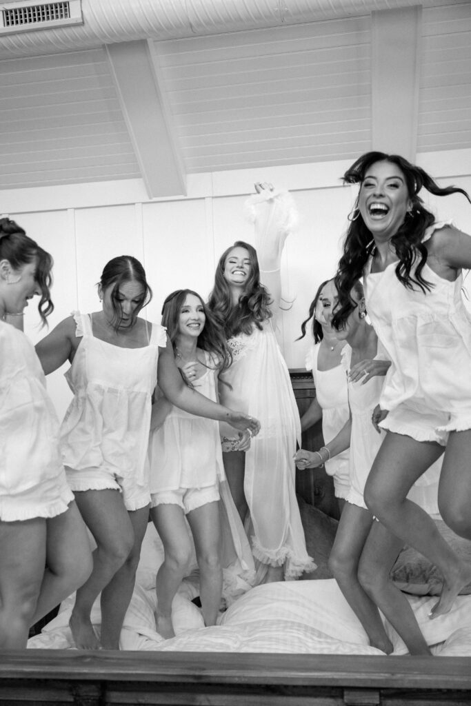 candid wedding getting ready moment bridesmaids laughing documentary photography